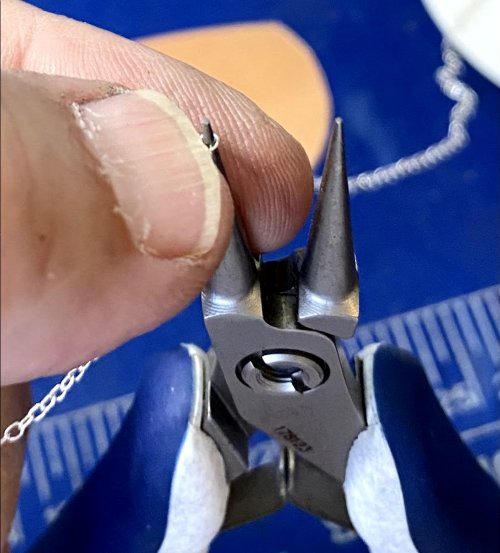 Susan LeGuyader's Tiny Chain Link Fix - , General Education, , , I used my thumbnail to slide it down 